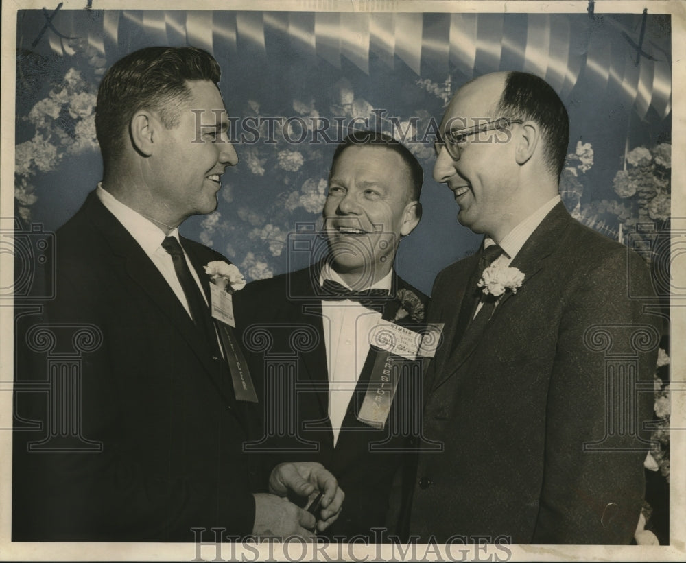 1964 Officers of the Southeastern Florist Association confer. - Historic Images