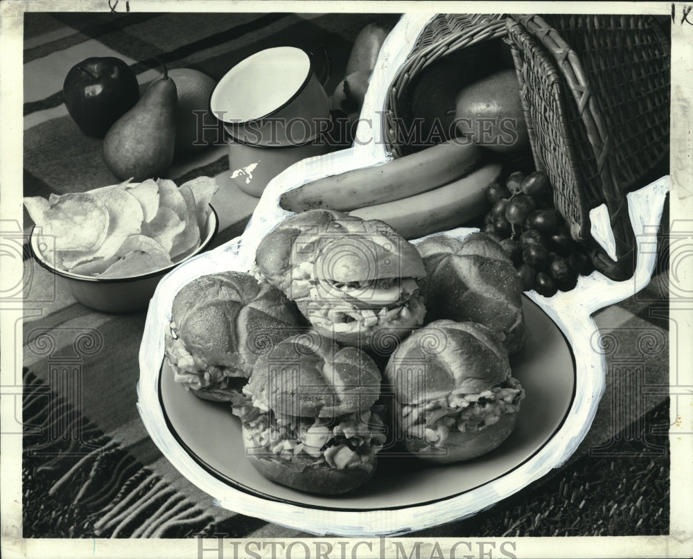 1975 Press Photo Plate of sandwiches with sides of fruit and potato chips - Historic Images