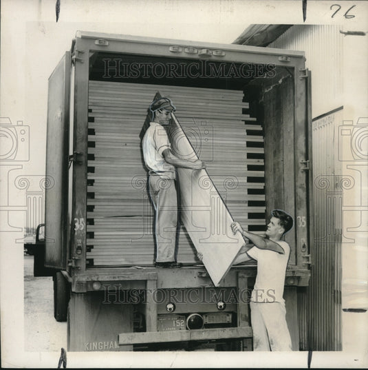 Press Photo Arthur LeBlanc Jr & Kenneth April Unload Doors from Fine Woods Co. - Historic Images
