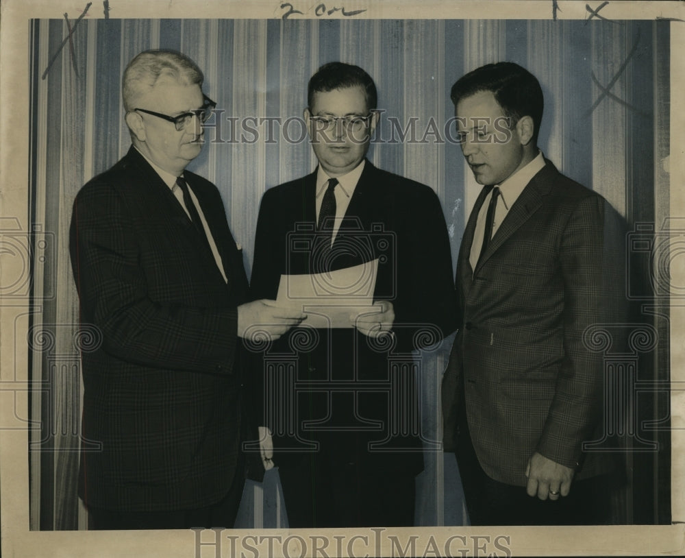 1965 Reverend Maynard Fountain Jr. talks members of the Presbytery. - Historic Images