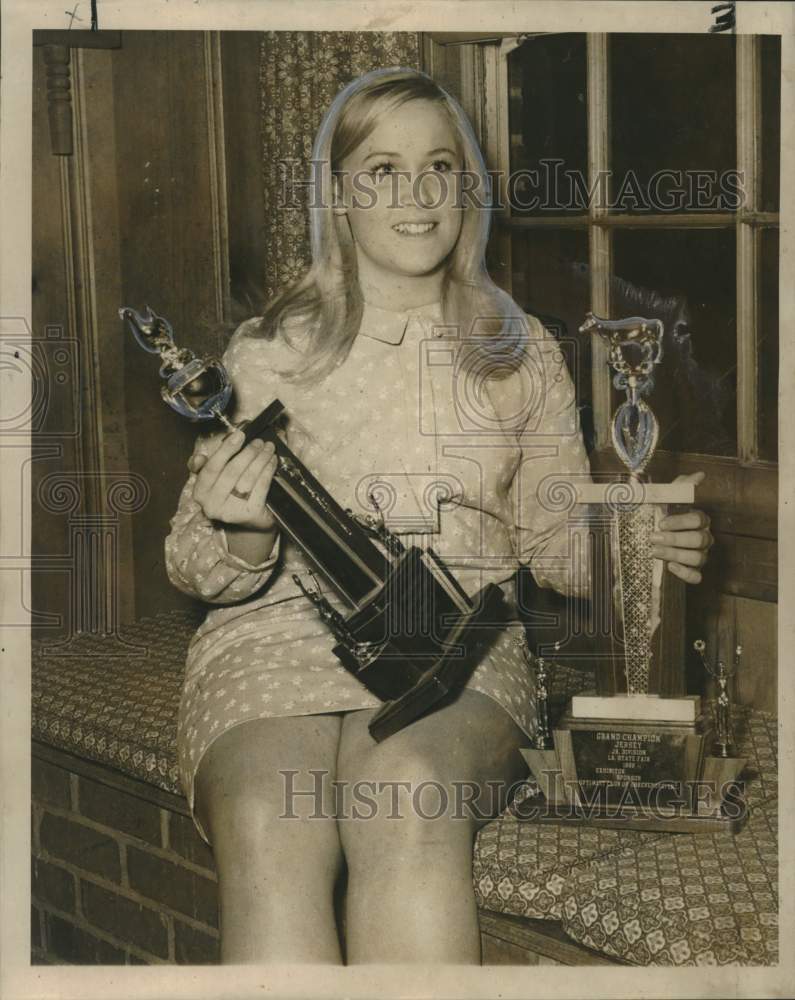 1969 Mary Dena Howe shows off trophies for poultry and dairy cows-Historic Images