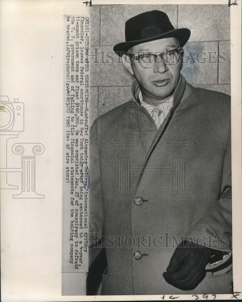 1960 Alexander Guterma, leaves federal courthouse in handcuffs-Historic Images