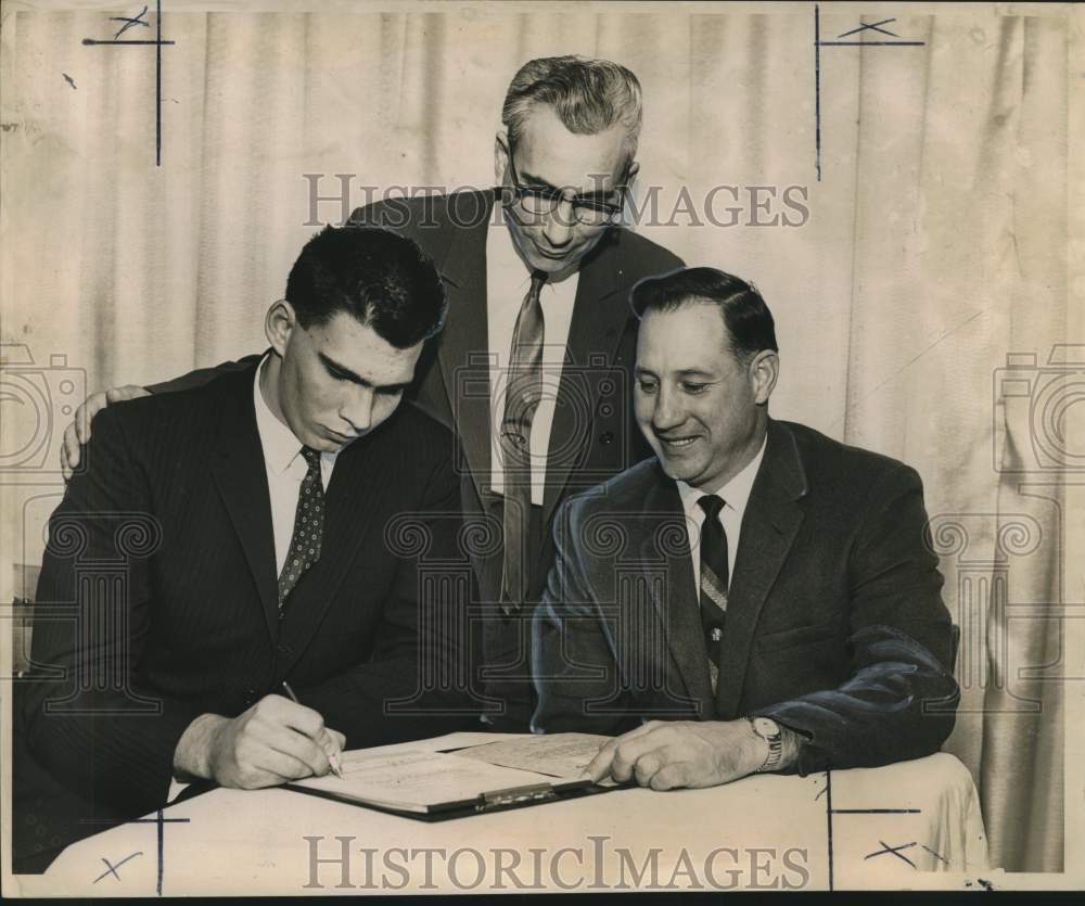 1963 Press Photo Doug Hamey &amp; Paul Alonzo Junior LUS signing - noo24144 - Historic Images