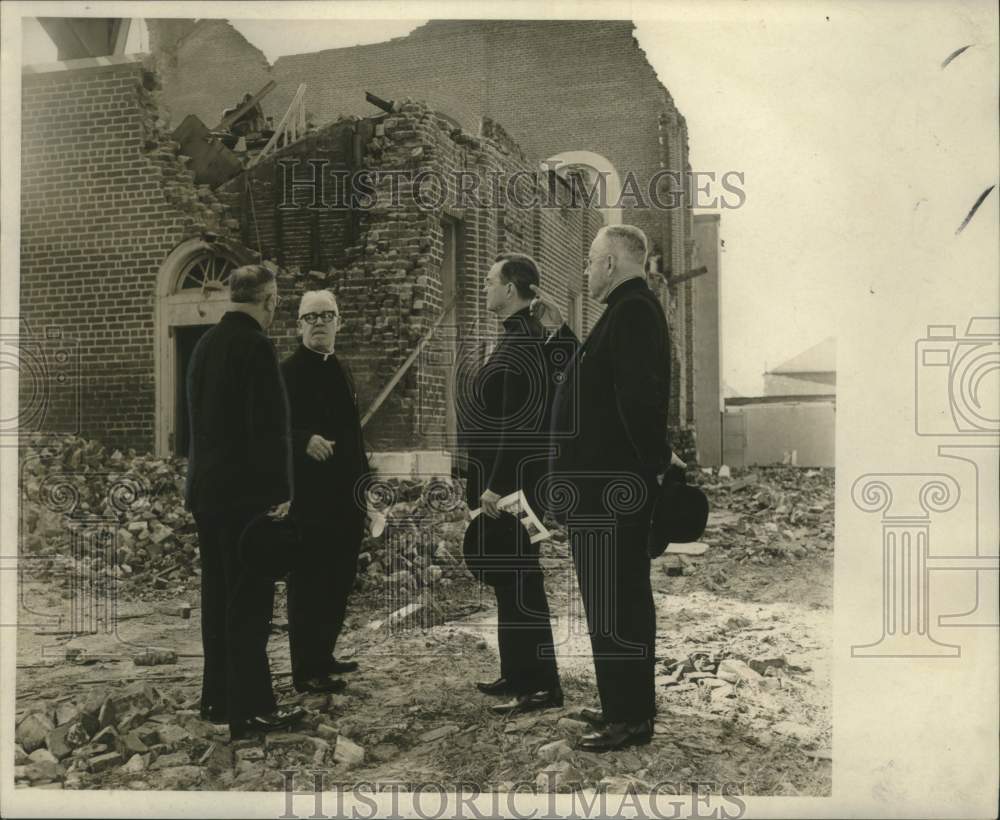 1965 Philip Matthew Hannan surveys damage to Holy Redeemer Church-Historic Images