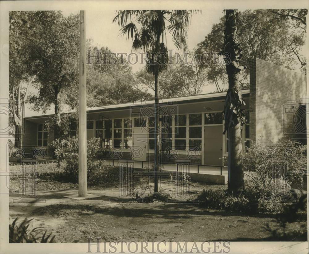 1955 Sleeping quarters open onto Flower-Adorned Patio - Historic Images