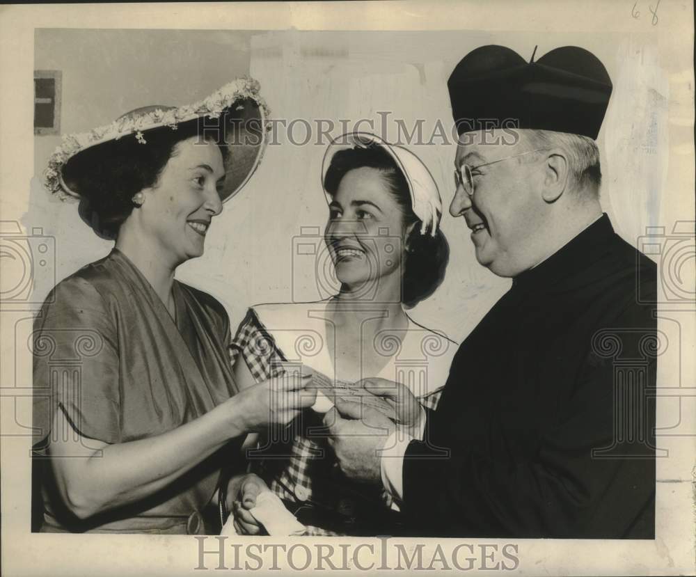 1953 Holy Name of Jesus Mothers&#39; Club donates a $7900 check - Historic Images