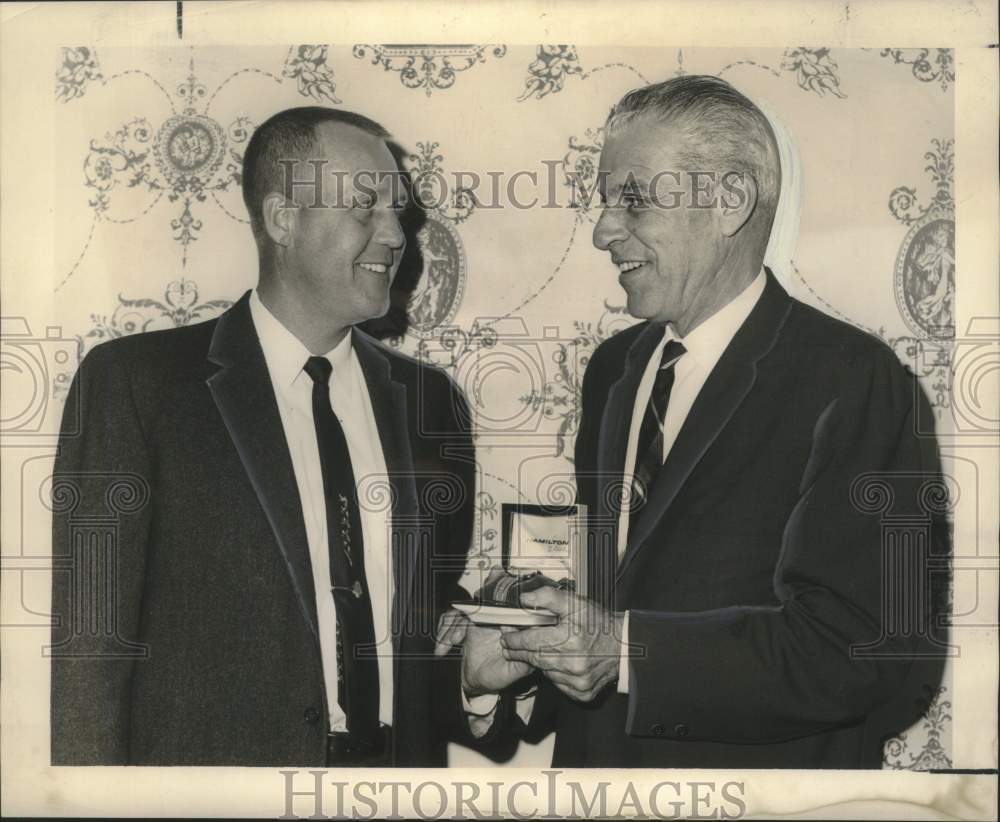 1965 Gordon Hebert honored by H.E. Trapp- Automotive Dealers - Historic Images