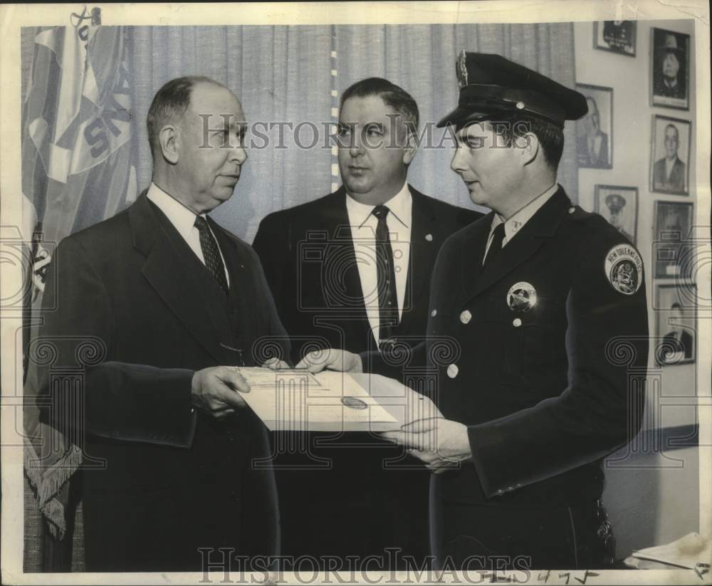 1962 Press Photo Ptn. Thomas Jackson receives Savings Bond from Arthur J. Naquin-Historic Images