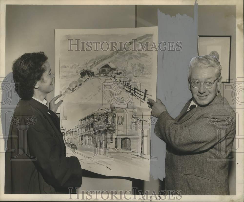 1953 Press Photo Mr.and Mrs. Ernst Huber with picture of their Alpine home - Historic Images