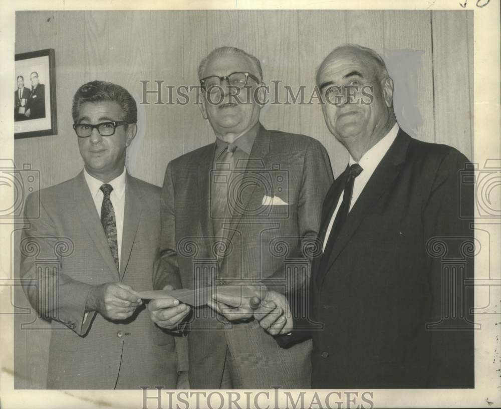 1968 Press Photo State-Item Children&#39;s Football Fund accepts checks donation-Historic Images