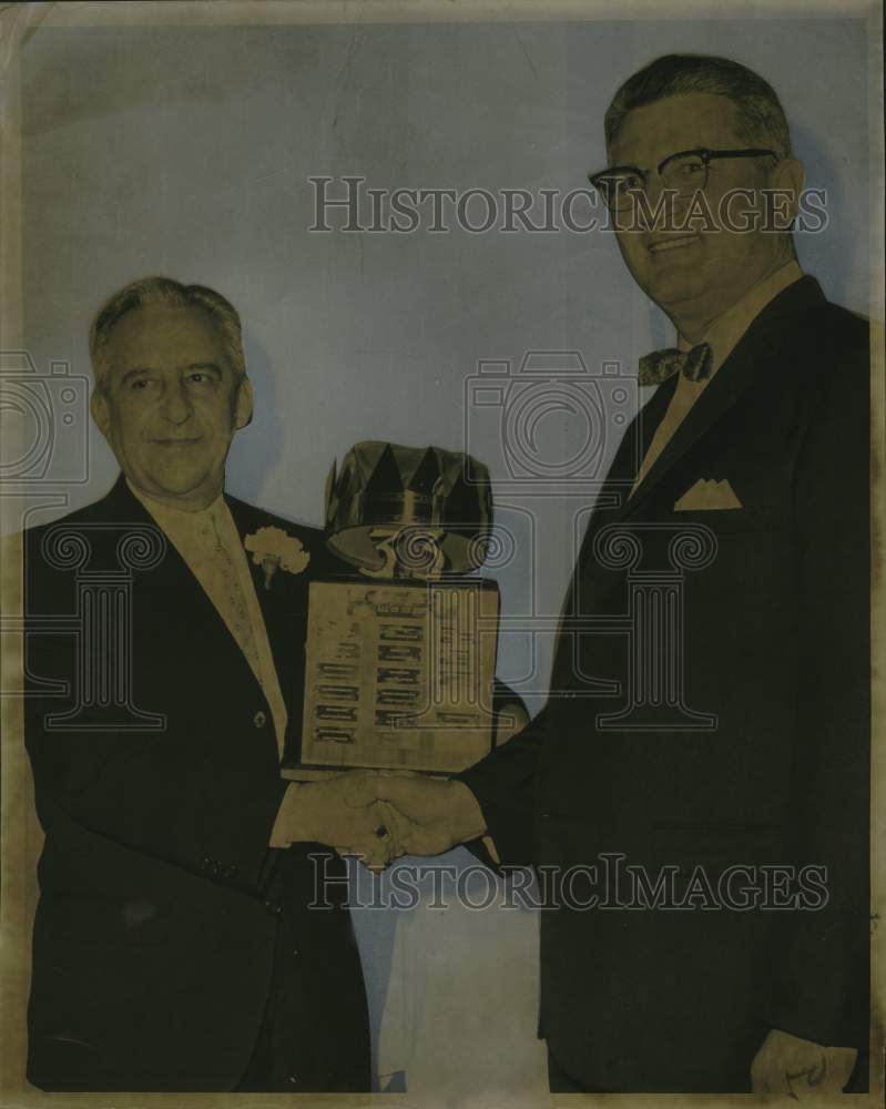 1964 Lester Klinger receives trophy for retirement, Sears Roebuck - Historic Images