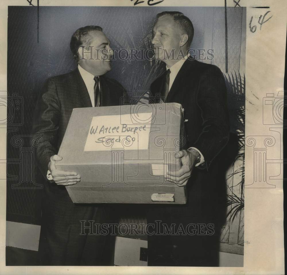 1965 James E. Fitzmorris Jr. receives donation from Gilbert Lagasse-Historic Images