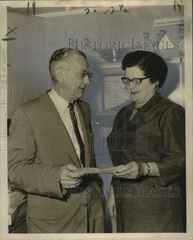 1955 W.B. White of White Brothers honors Ruby Jochum for her service - Historic Images