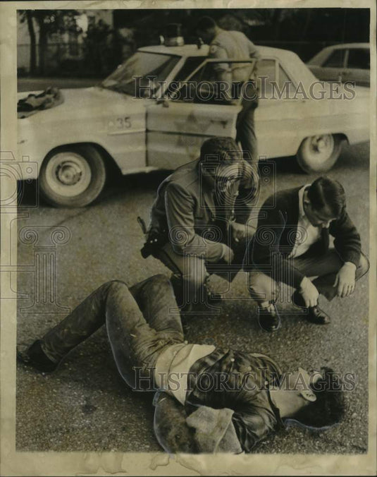 1967 Burglary suspect lies on ground & questioned by Deputy Sheriff-Historic Images