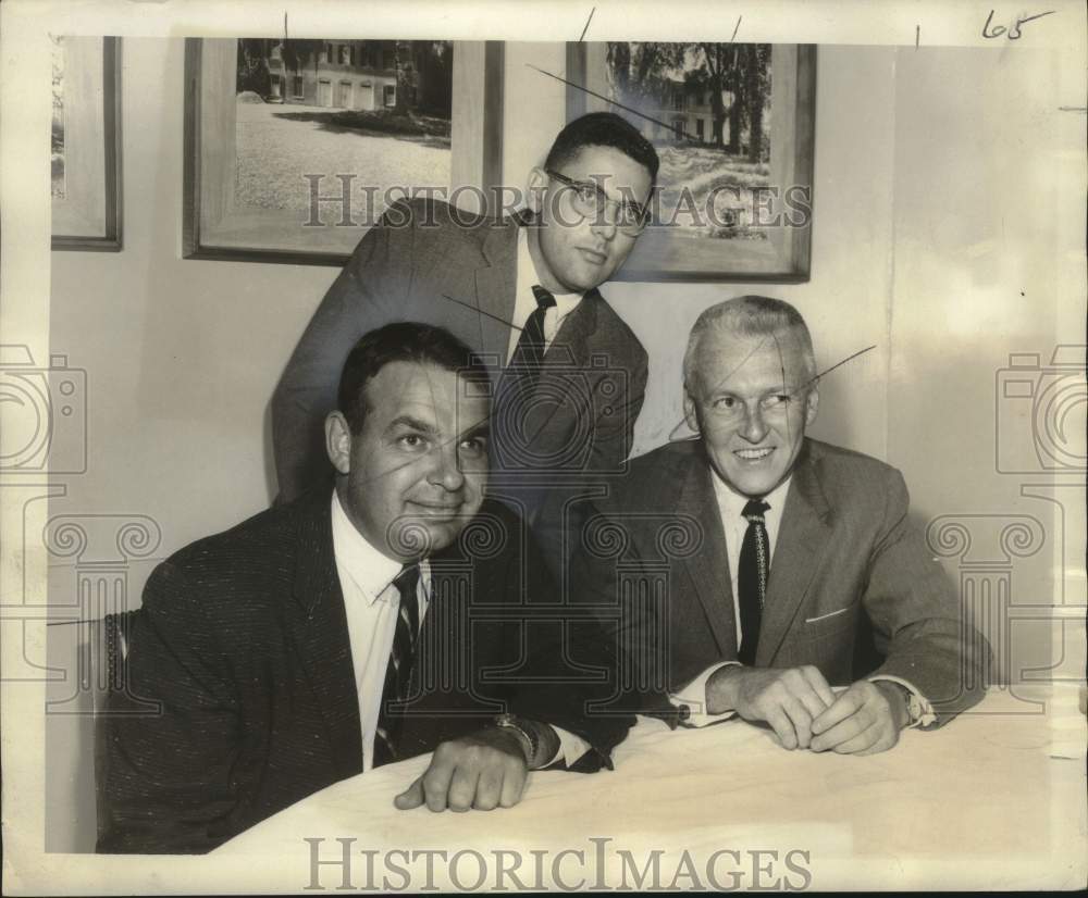 1957 Press Photo Printing officials discuss printing paper demand in New Orleans - Historic Images