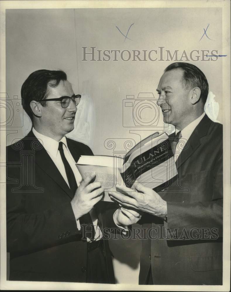 1969 Dr. Dominique Tulasne conferring with Dr. Herbert Longenecker - Historic Images