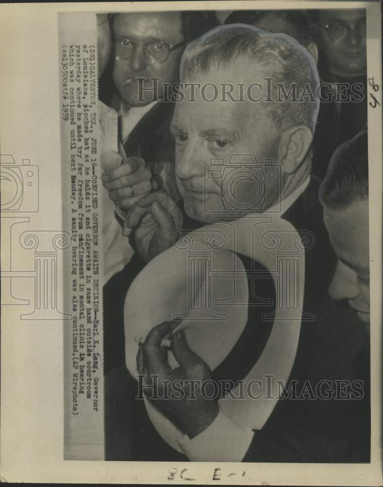 1959 Governor Earl K. Long awaits decision in hearing in Texas-Historic Images