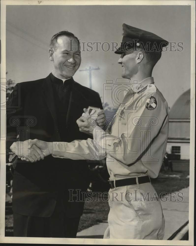 1960 Lawrence L. McNamara honored by Reverend W. Patrick Donnelly-Historic Images