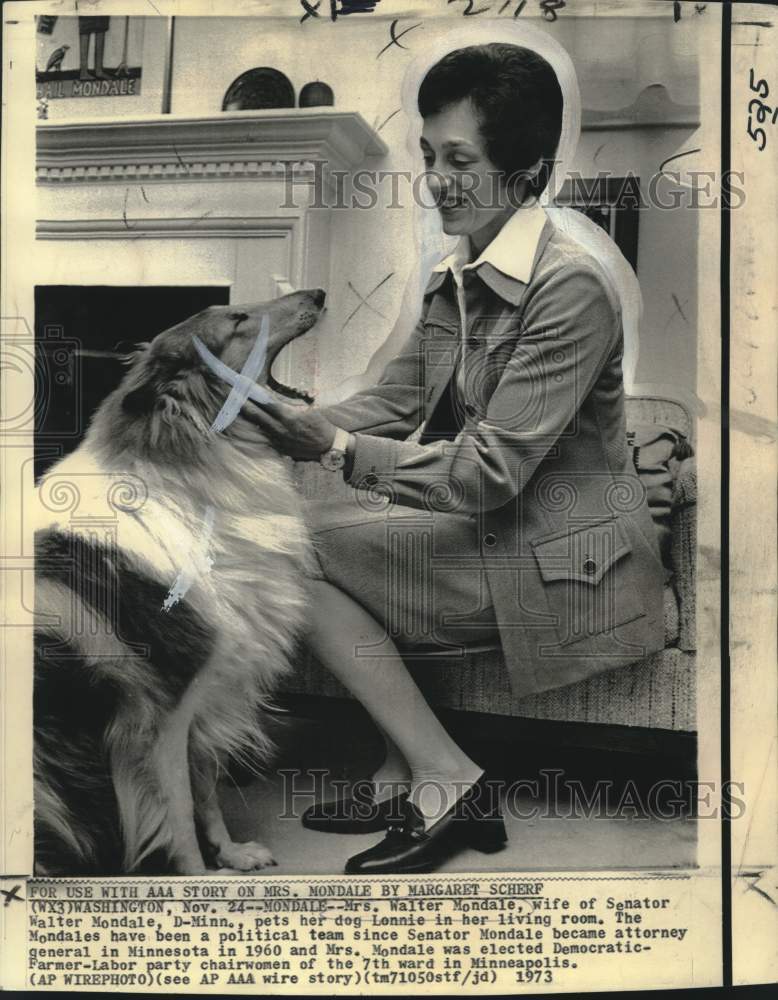 1973 Mrs. Walter Mondale at home with her dog - Historic Images