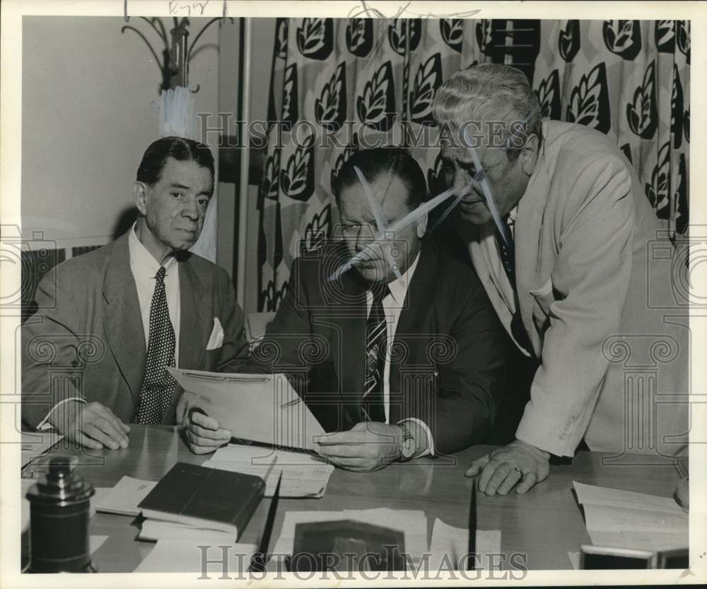 1954 Dignitaries looking over the Proclamation for World Trade Week - Historic Images