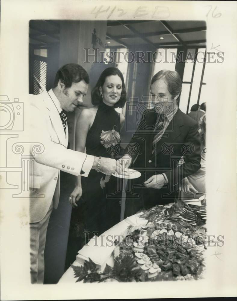 1976 Yann Petit with Angela &amp; Paul Fabry at a party - Historic Images