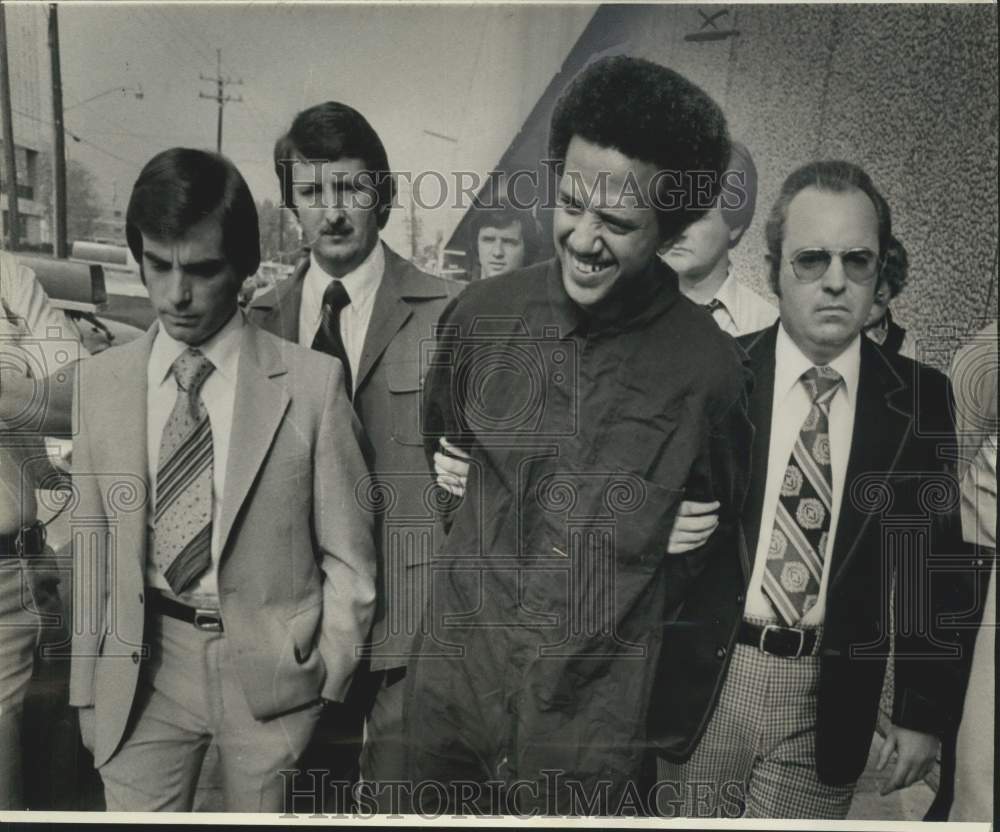 1977 Carlos Poree taking him into custody to Central Lockup - Historic Images