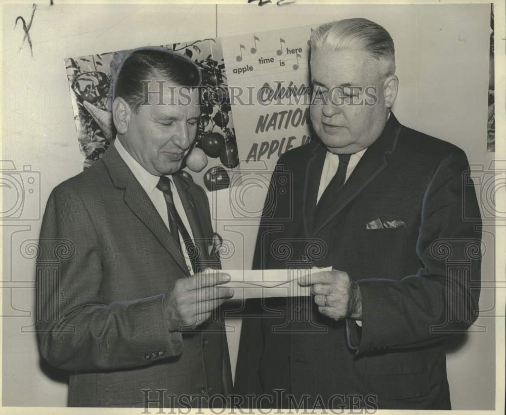 1966 George Queen accepts check from John Ryan in New Orleans-Historic Images