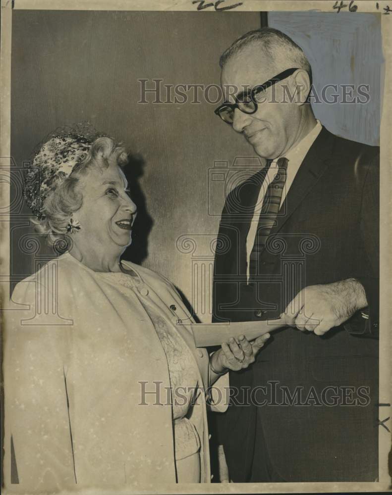 1966 Mrs. William Lamont of Pilot Club gives check to Jack Rosen-Historic Images