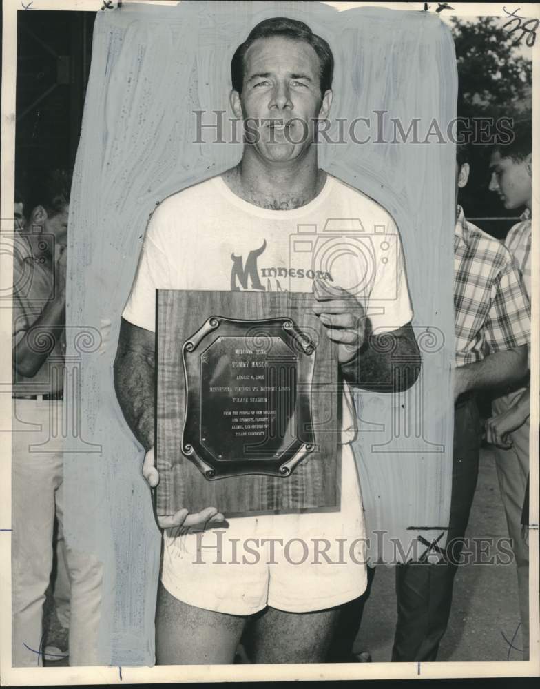 1966 Press Photo Football - Tom Mason holds a plaque - noo59526 - Historic Images