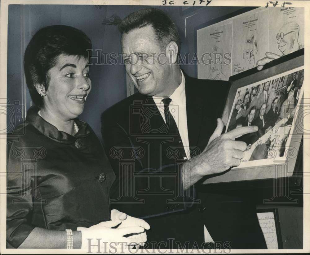 1964 Elliott Roosevelt shows to his wife FDR photo made in 1937-Historic Images