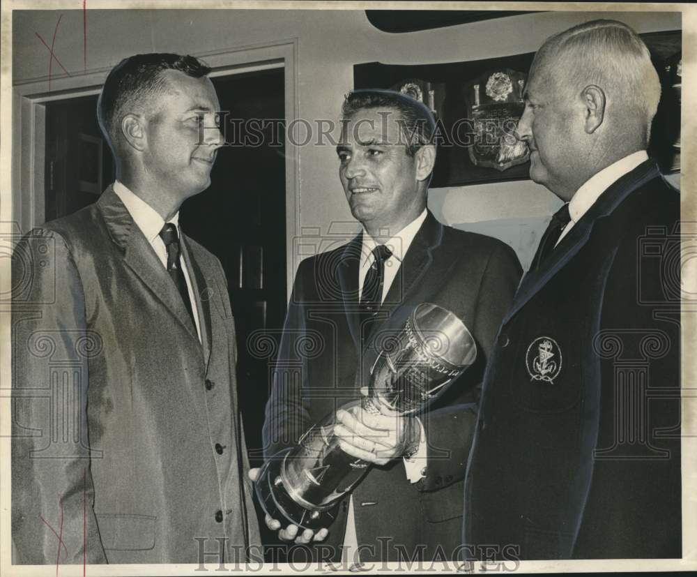 1966 Press Photo S. W. Provensal Jr. Southern Yacht Club Commodore Holds Trophy - Historic Images