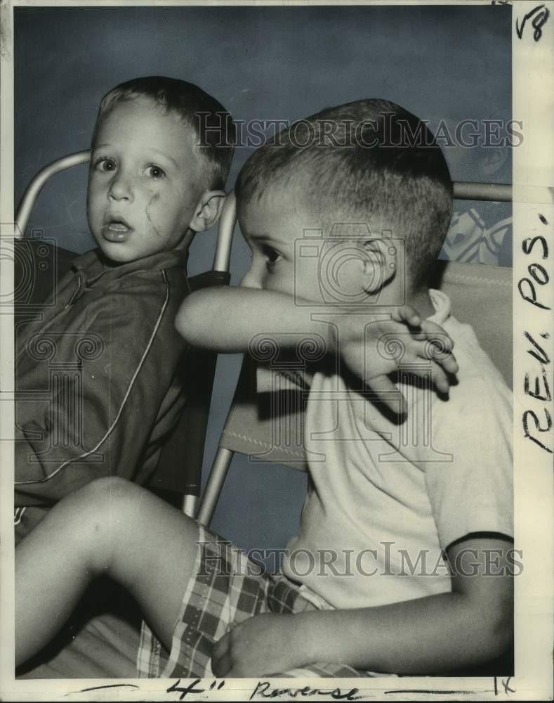 1970 Two young boys enjoying New Orleans public library program. - Historic Images