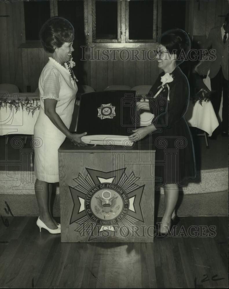 1969 Mary Pichoff presents Auxiliary scrapbook to Gloria Herrmann - Historic Images