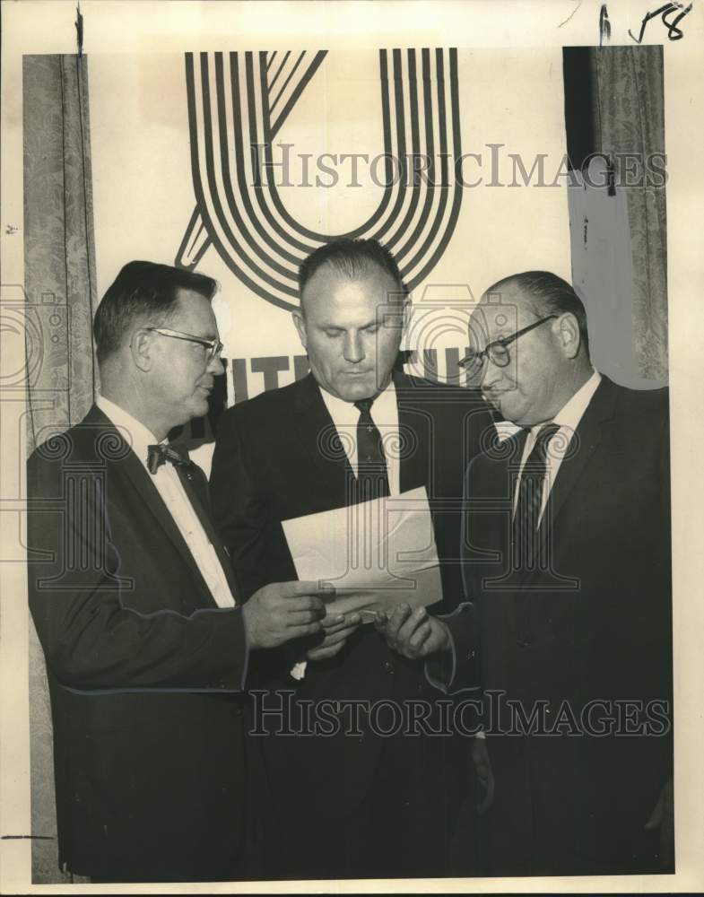 1968 Attendees at Saints Day luncheon listen to United Fund report - Historic Images