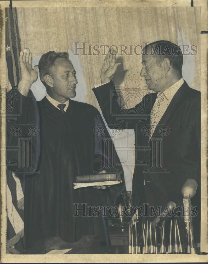 1968 Dr. Carl H. Rabin takes oath of office, Judge Paul P. Garofalo - Historic Images