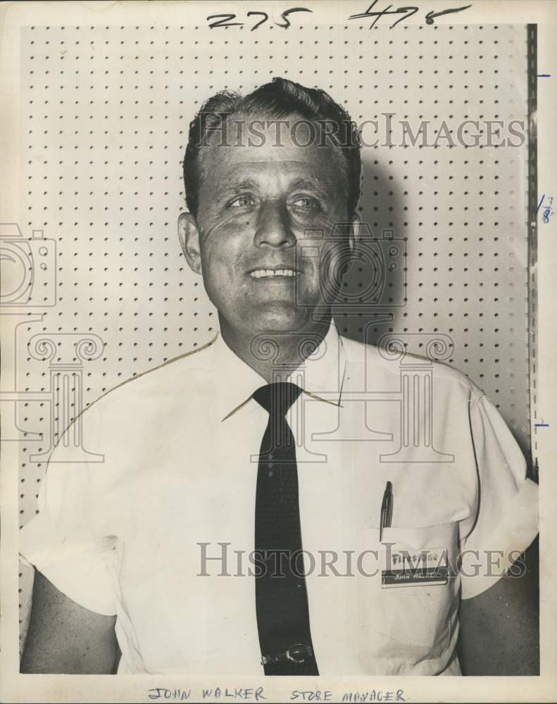 1965 John Walker, Firestone store manager - Historic Images