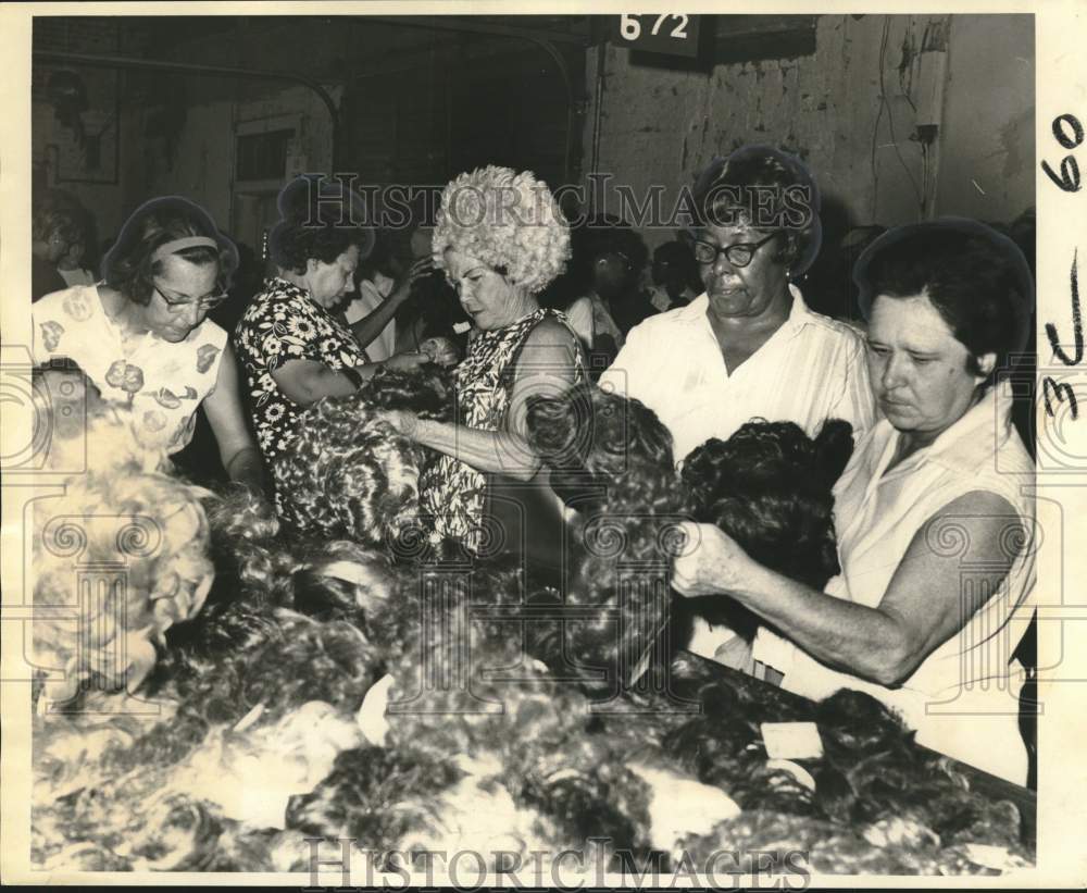 1970 Shoppers at Grand Opening of wig wholesale outlet on N. Rampart - Historic Images