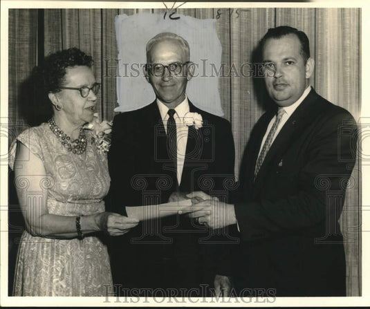 1962 Trinity Congregation gives gift to Reverend Arthur Widiger - Historic Images