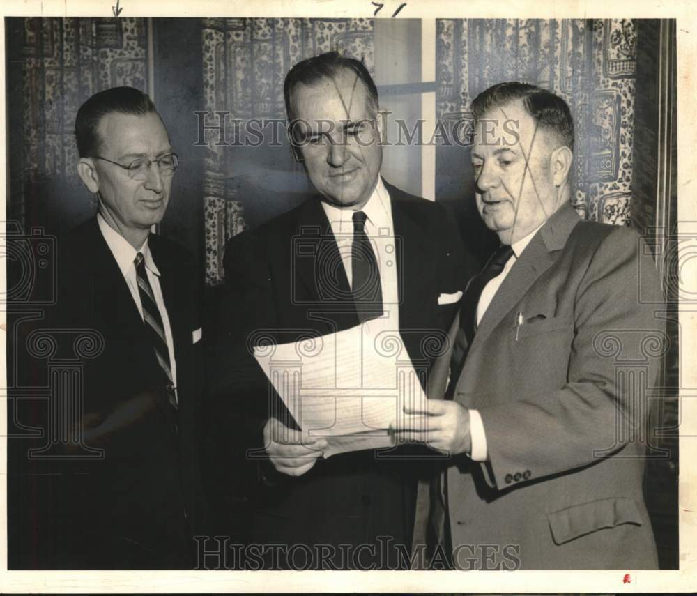 Clarence Yancey and convention members view Proclamation. - Historic Images