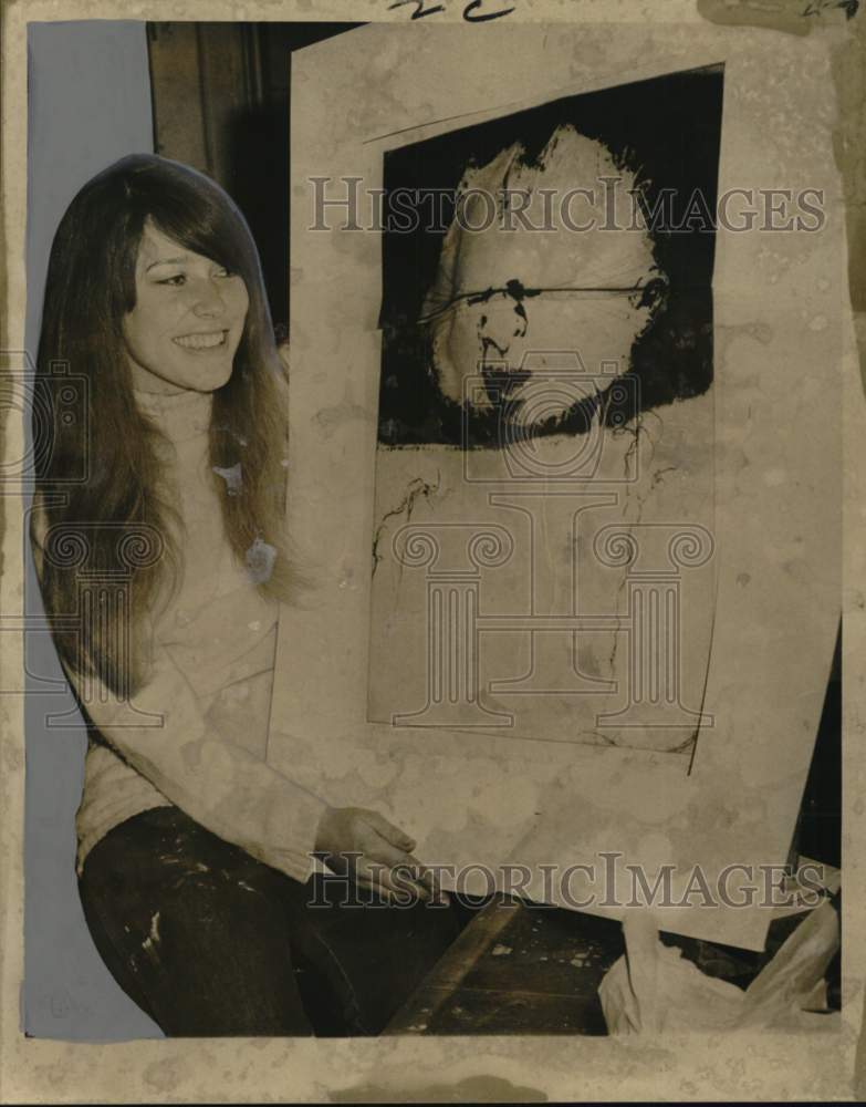 1970 Gail Singleton displays a James Steg print to be displayed - Historic Images