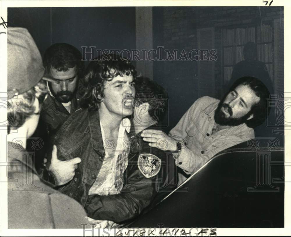 1979 Jefferson Parish Deputies restrain Michael Waddle - Historic Images