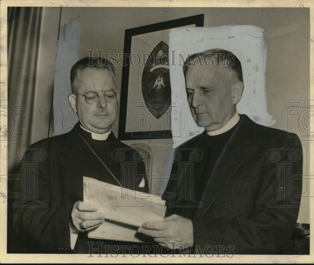 1953 Reverends Girault Jones and Thomas Sinclair make church plans - Historic Images