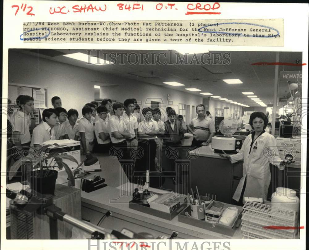 1984 West Jefferson Hospital technician with high school students - Historic Images