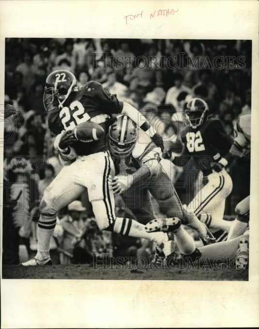 1977 Press Photo Forced football fumble by Steve Ripple for Bama's Tony Nathan- Historic Images