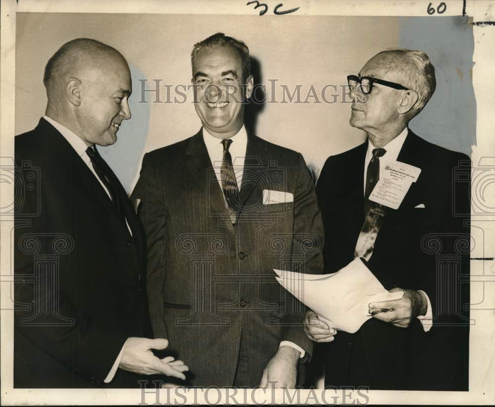 1965 Charles Webb chats with NIT members in New Orleans. - Historic Images