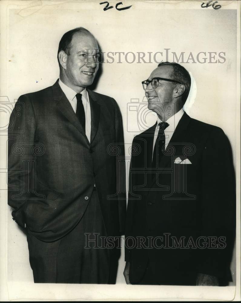 1969 Illinois Central officials Allen Boyd and Philip Webb confer - Historic Images