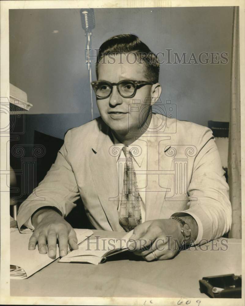 1957 Frank F. Stich Jr. seated in Portrait - Historic Images