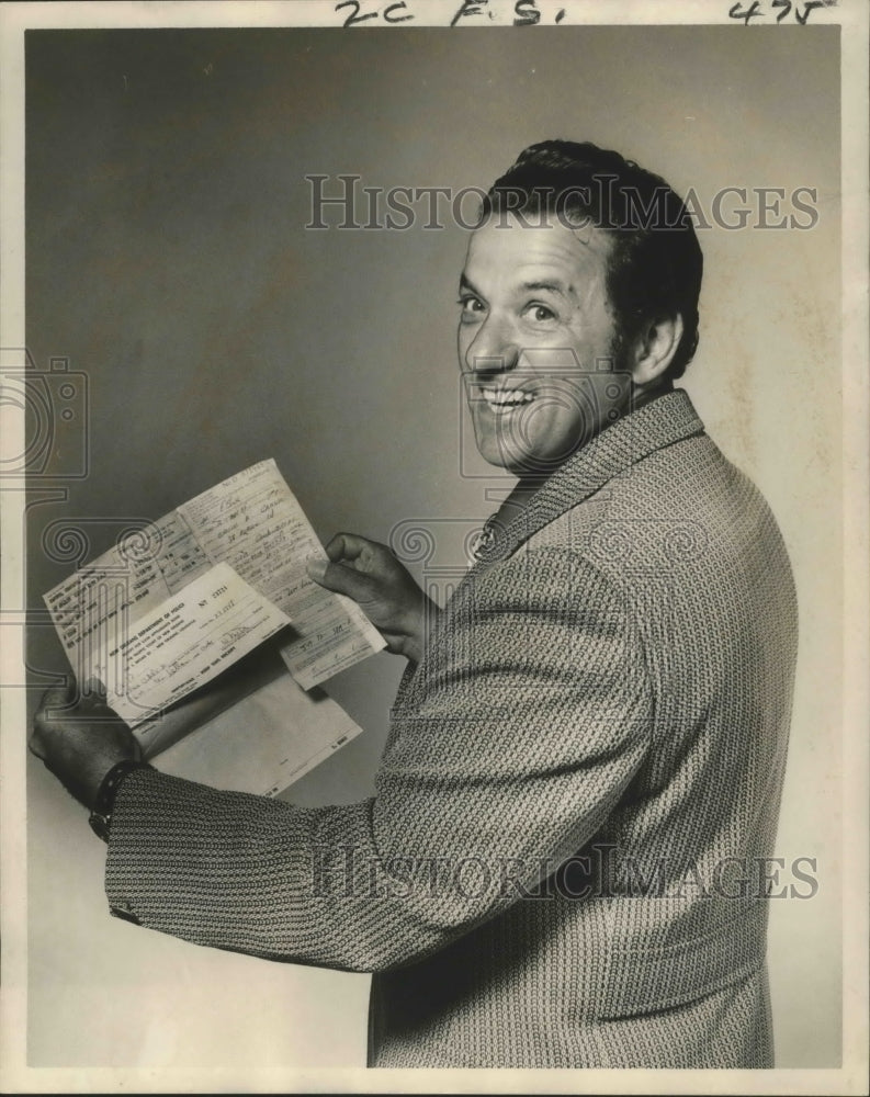 1972 Metropolitan Opera tenor Charles Anthony shows traffic tickets. - Historic Images