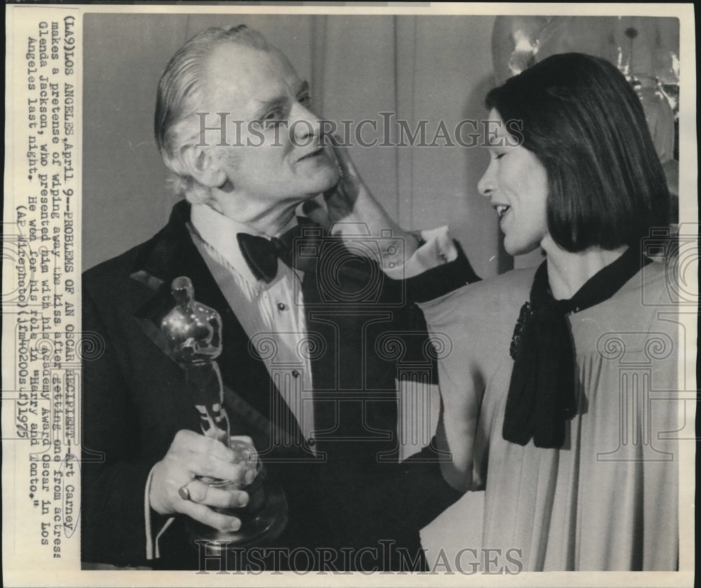 1975 Oscar winner Art Carney pretends to wipe Glenda Jackson&#39;s kiss - Historic Images