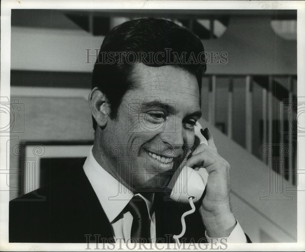 1969 Paul Burke, actor, on the telephone - Historic Images